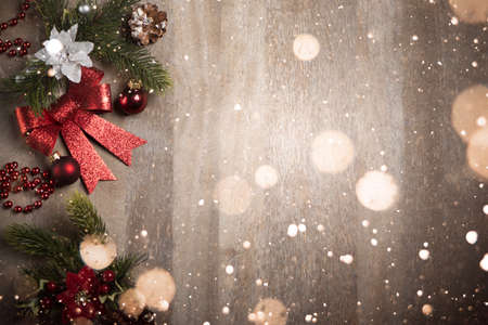 Top view of a Christmas background on wooden boardsの写真素材