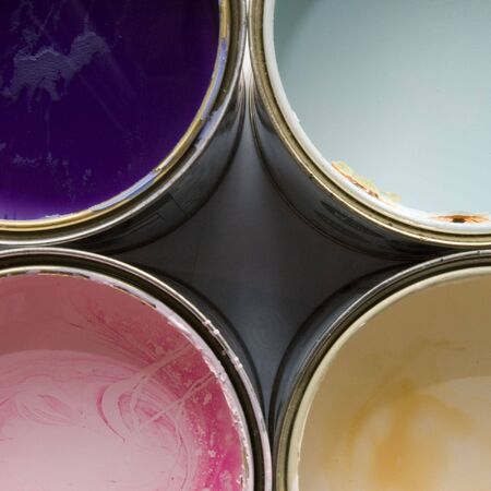 Open cans of paint prepared for paint workの写真素材