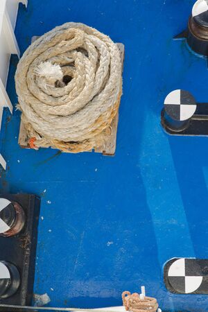 Detail of ropes and tie rods on the deck of the ship