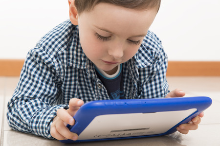 teenager studying with tablet
