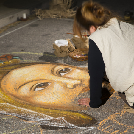 street artist who paints the face of Maryの写真素材