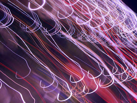 abstract background with swuirl lights from the streets