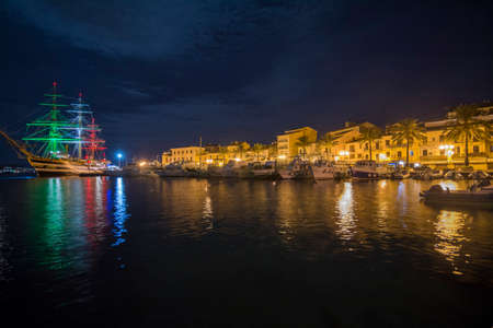 La Maddalena, at night with the sailing ship Amerigo Vespucciの写真素材