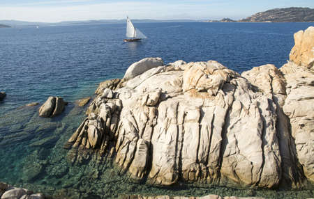 Sailboat sailing in Sardiniaの写真素材