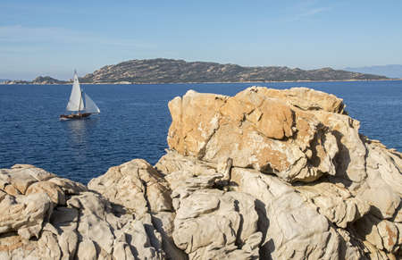 Sailboat sailing in Sardiniaの写真素材