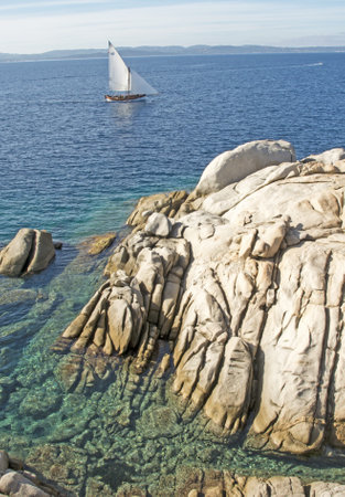 Sailboat sailing in Sardiniaの写真素材
