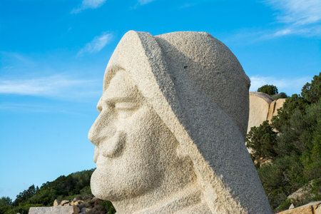 Sculpture of the head of a man in the park of the ancient city of Tossa de Marの写真素材
