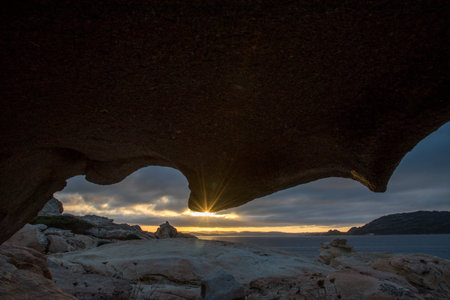 Sunset at the coast of the island of Sardinia, Italyの写真素材