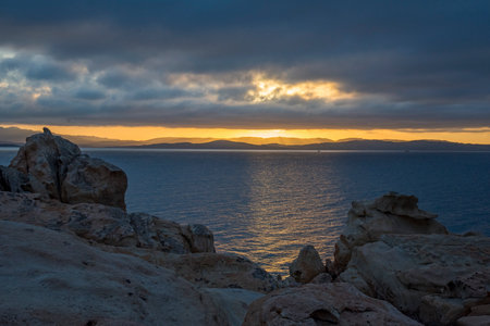 Sunset over the sea in Ibiza, Balearic Islands, Spainの写真素材