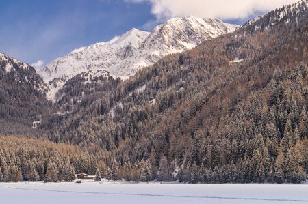 Anterselva lake frozen in its mountains