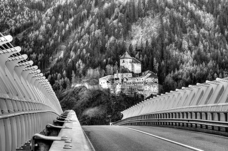 Castel Tasso, a bridge to the past: a modern bridge that leads to a small and ancient castleのeditorial素材