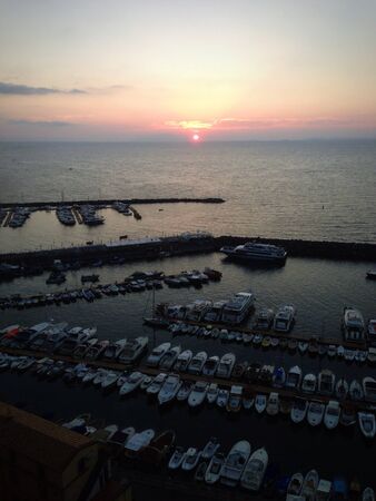 Sunset over the little portの素材