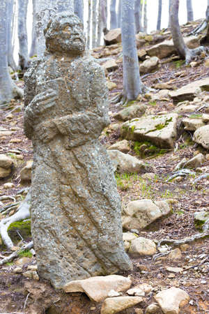 Christian sculpture of a figure in the woodsの写真素材