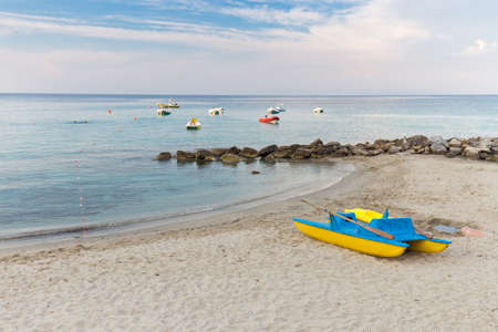 boats on the sea and on the beachの写真素材
