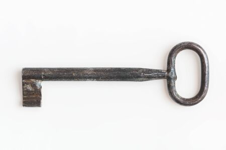 Single old keys isolated with clipping path on white background