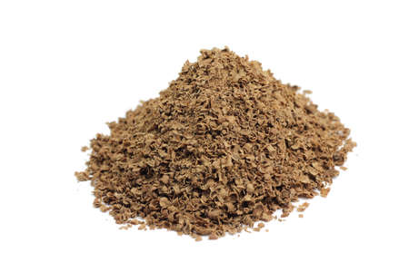 Handful of crushed chocolate on white backgroundの写真素材
