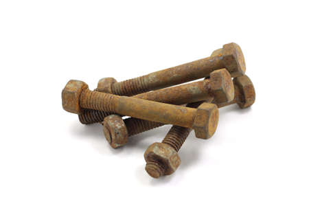 Rusty bolts isolated on white backgroundの写真素材