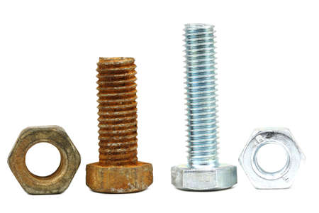 Old and new construction fasteners on white backgroundの写真素材