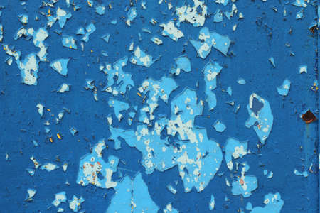 covered with blue paint cracked background 