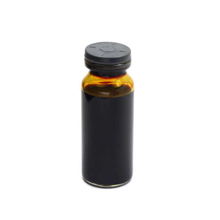 a vial with a solution of iodine isolated on white の写真素材