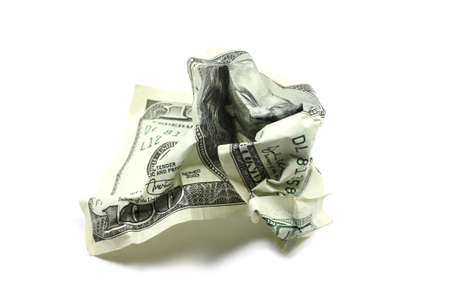 crumpled dollar bills on a white の写真素材