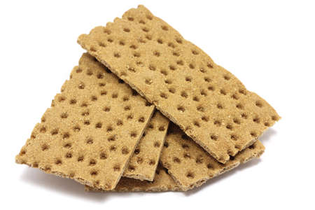 few loaves of bran on white backgroundの写真素材
