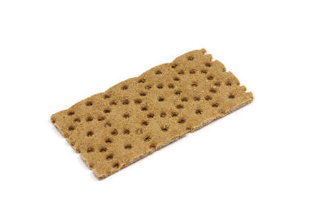 brown loaf of bran on white backgroundの写真素材