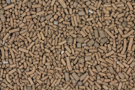 Big brown catalyst pellets abstract backgroundの写真素材