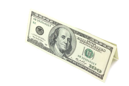 bills of one hundred dollars on a white backgroundの写真素材