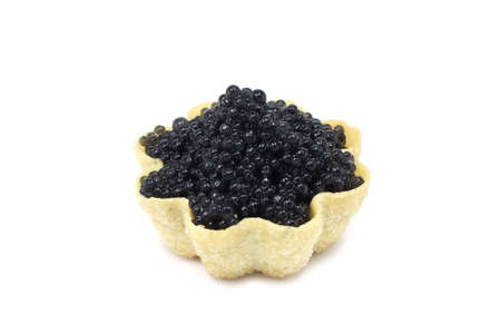 black caviar in tartlets on white backgroundの写真素材