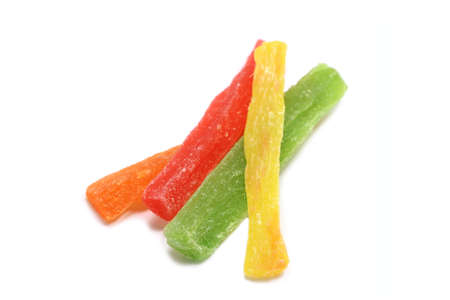 a few pieces of dried colored pastilles on a white backgroundの写真素材