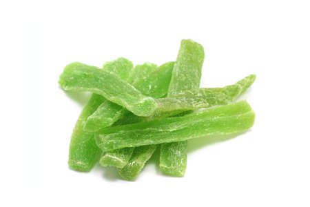 Dried fruit candy is green on a white backgroundの写真素材