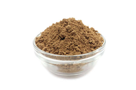 cocoa powder a glass container on a white backgroundの写真素材