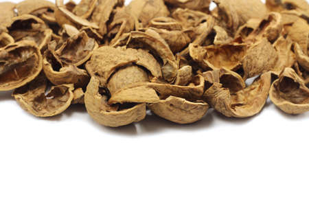 broken shells of walnuts abstract backgroundの写真素材