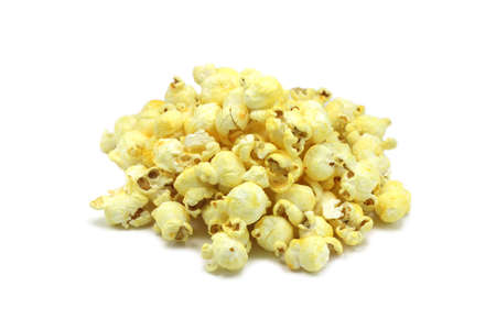 a handful of popcorn on a white backgroundの写真素材