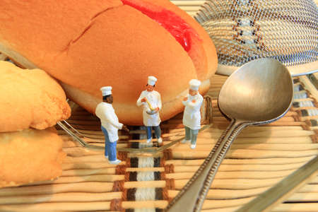 Little cooks are taking in bakery house.の写真素材