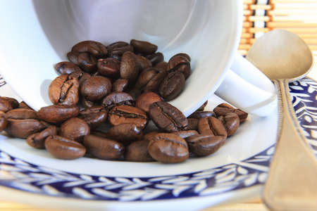 Closed-up coffee beans in the cup.の写真素材