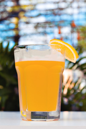 Light unfiltered beer with foamの写真素材