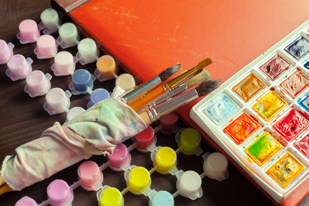 Set of watercolor paints and paintbrushes for paintingの写真素材