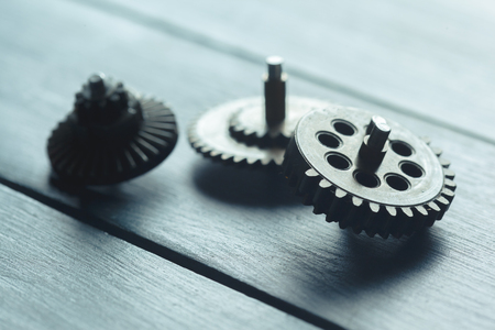 gears on the dark wooden background
