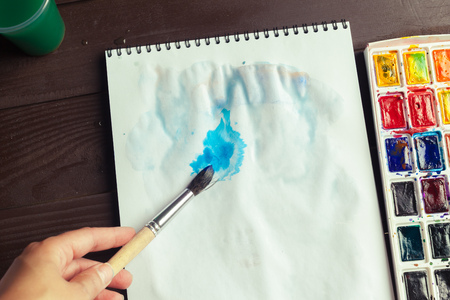 Set of watercolor paints and paintbrushes for paintingの写真素材