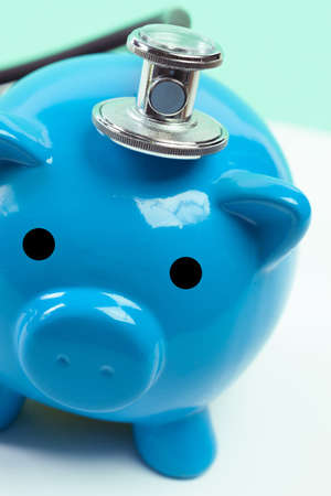 Blue piggy bank or money boxの写真素材