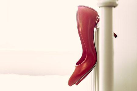 Red women shoes in roomの写真素材