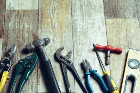 Working tools on wooden rustic background. top viewの写真素材