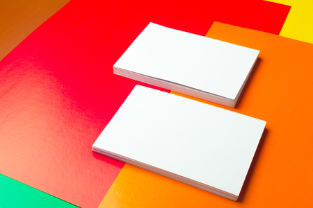 Business card blank over colorful abstract background.の写真素材