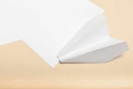 Blank paper  on top of pink pastel deskの写真素材