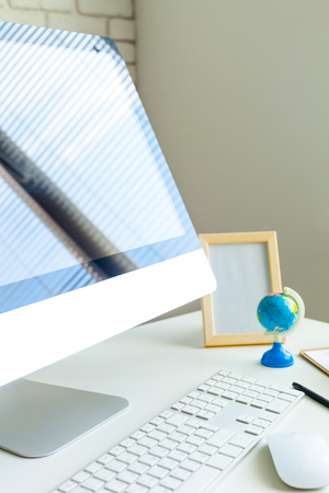 working table with computerの写真素材