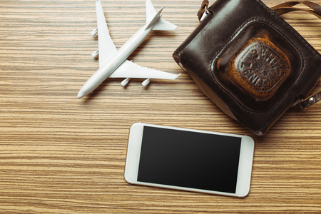 Preparation for Traveling concept. Smartphone, airplaneの写真素材