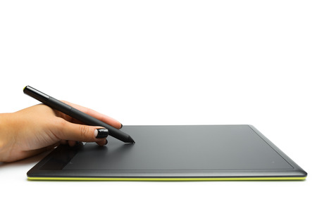 Graphic tablet with pen and hand for illustrators and designers, isolated on white backgroundの写真素材