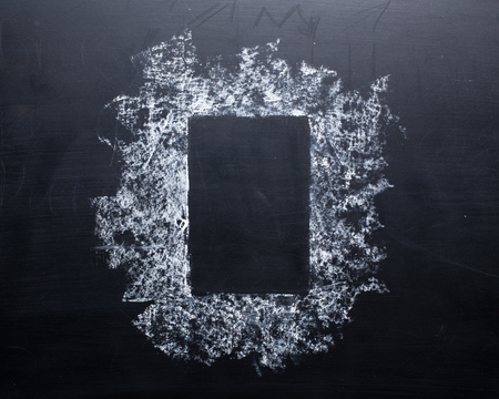 Hand drawing chalk frame on blackboardの写真素材